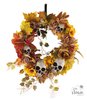 Halloween kranssi, kukkia ja pääkalloja